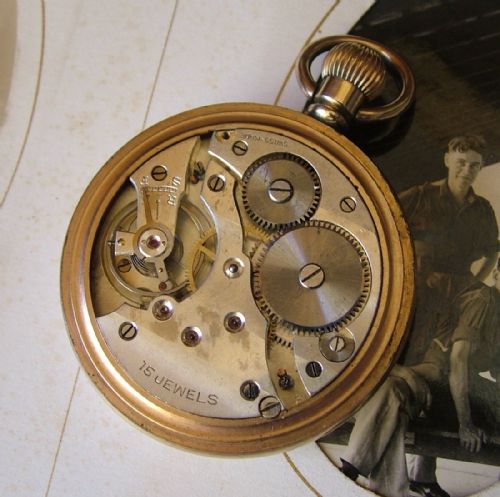 fig 1. An antique Swiss open faced pocket watch