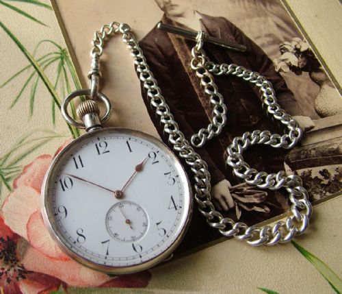 Antique Silver Omega Pocket Watch and Chain