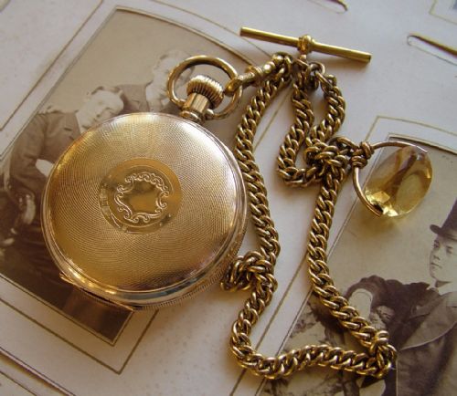 fig 1. Antique J W Benson pocket watch with chain and fob