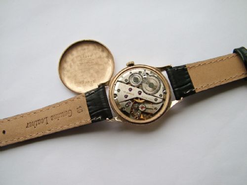 fig 2. A gents 9 carat gold Garrard wrist watch, 1957