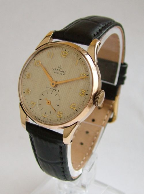 A Gents 9ct Gold Smiths De Luxe Wrist Watch, 1951