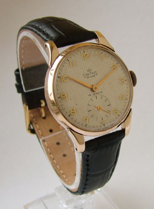 fig 1. A gents 9ct gold Smiths De Luxe wrist watch, 1951