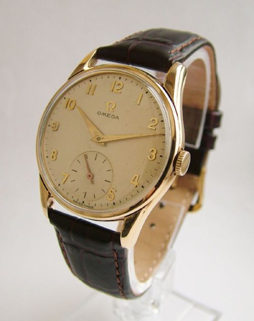 A Gents 9 Carat Gold 1950s Omega Wrist Watch