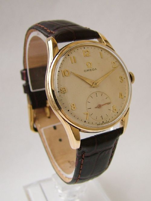 fig 1. A gents 9 carat gold 1950s Omega wrist watch