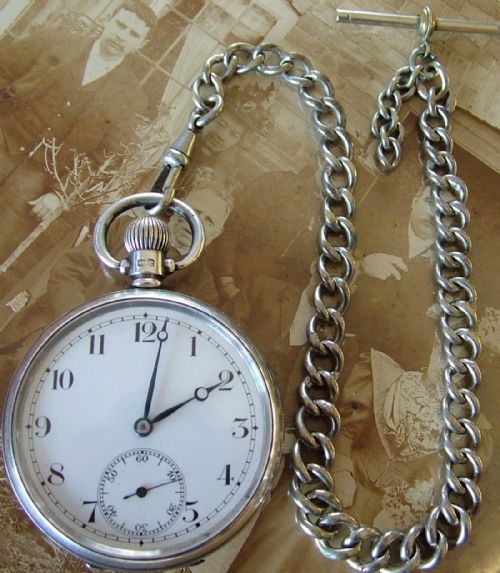 A 1940s Silver Horos Pocket Watch and Chain