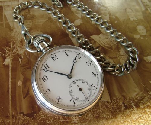 fig 1. A 1940s silver Horos pocket watch and chain