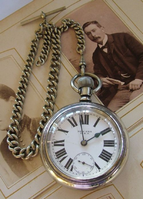 fig 1. An antique New Era pocket watch and chain