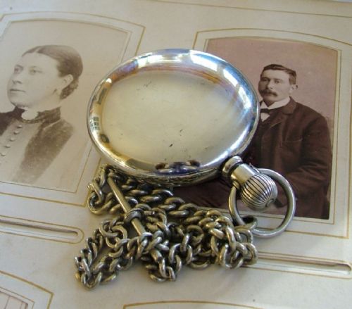fig 2. An antique New Era pocket watch and chain