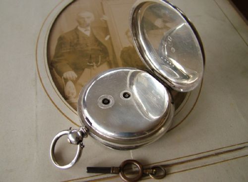 fig 1. An antique silver pocket watch with history