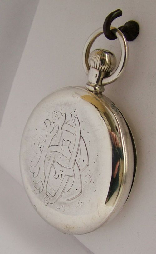 fig 1. An antique silver Waltham full hunter pocket watch