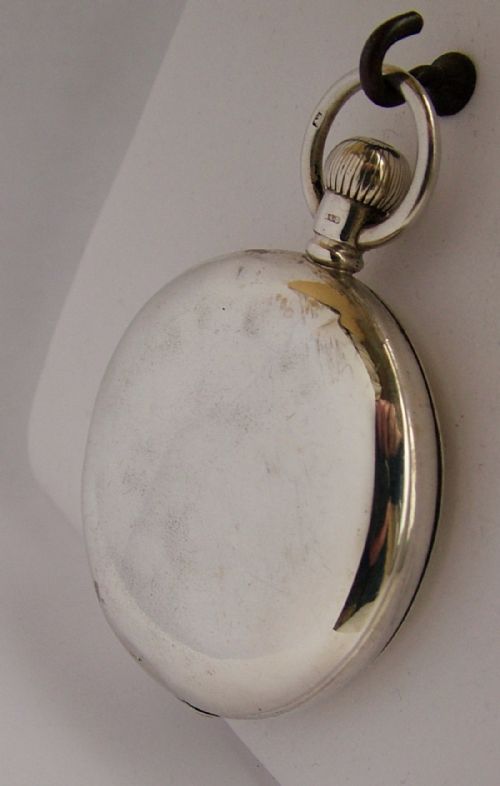 fig 2. An antique silver Waltham full hunter pocket watch