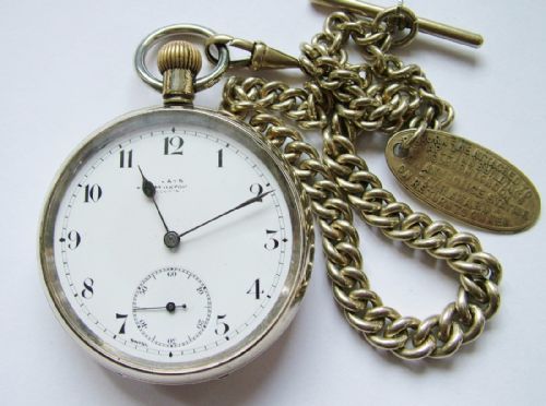 An Antique Omega Pocket Watch with Chain