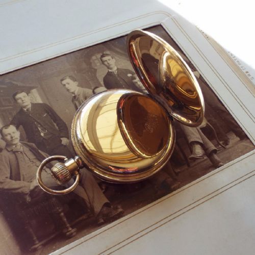 fig 2. An early 20th Century open faced pocket watch