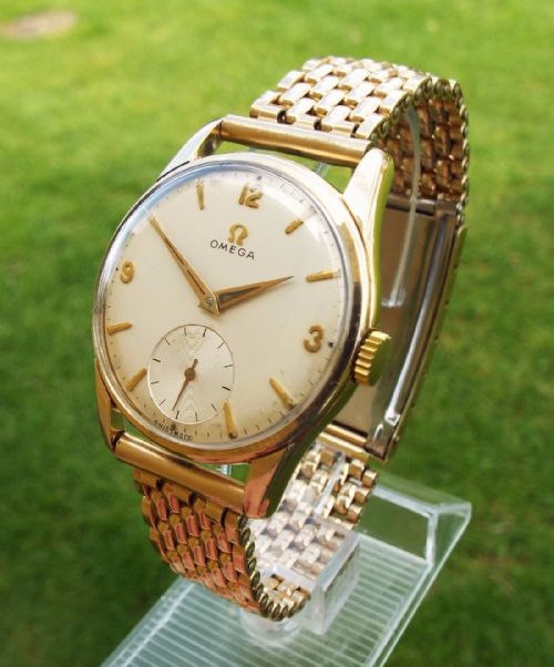 A Gents 9 Carat Gold Omega Wrist Watch, 1960