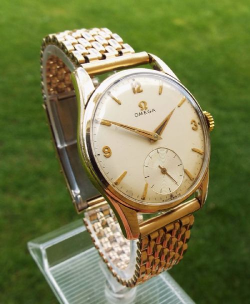 fig 1. A gents 9 carat gold Omega wrist watch, 1960