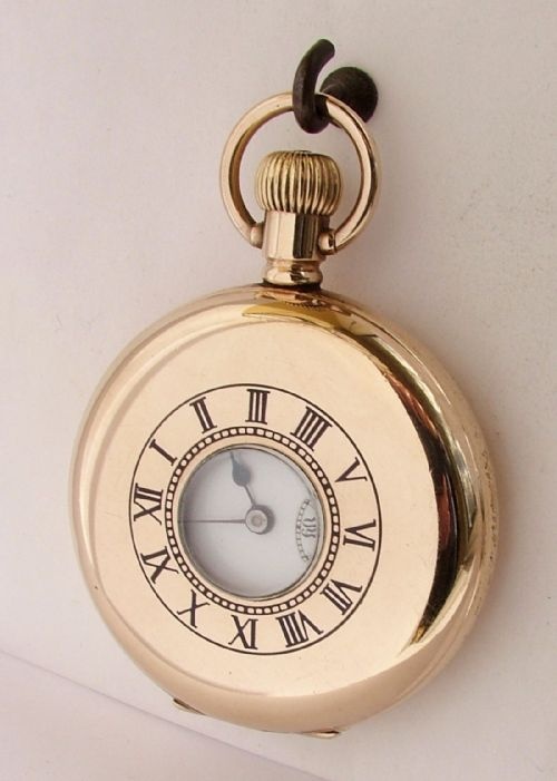 A 1920s Half Hunter Pocket Watch.