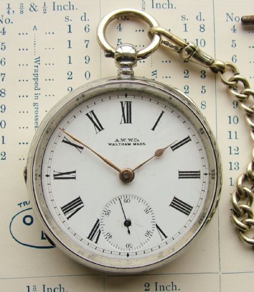fig 1. An antique Waltham pocket watch with albert.
