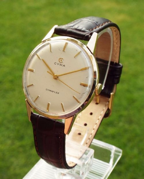 fig 1. A gents 9 carat gold Cyma wrist watch, 1960
