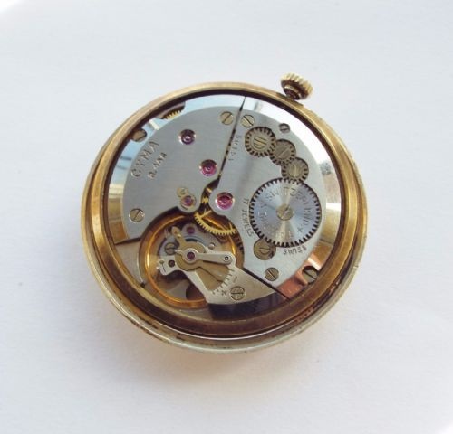 fig 2. A gents 9 carat gold Cyma wrist watch, 1960