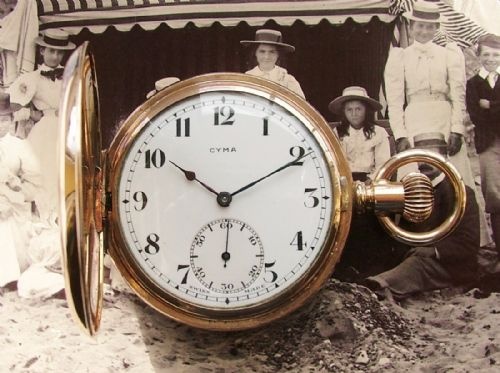 A 1920s Cyma Full Hunter Pocket Watch.
