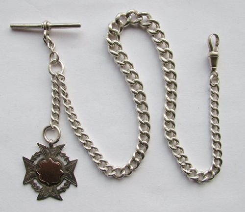 An Antique Silver Single Pocket Watch Chain and Fob.
