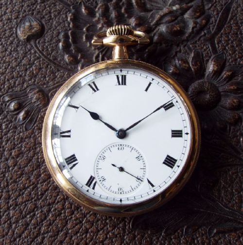 An Ornate Antique Open Faced Pioneer Pocket Watch