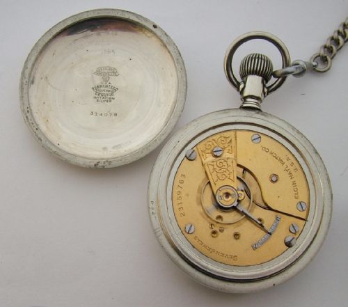 fig 3. A large 1920s Elgin pocket watch, chain & vesta