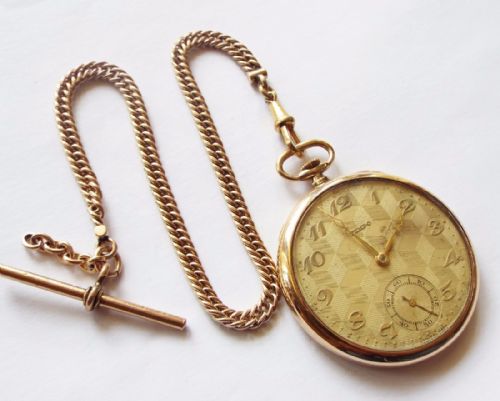 A 1930s Tempo Pocket Watch with Chain