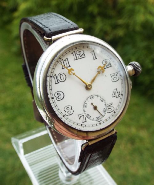 fig 1. A gents silver Longines wrist watch, 1928