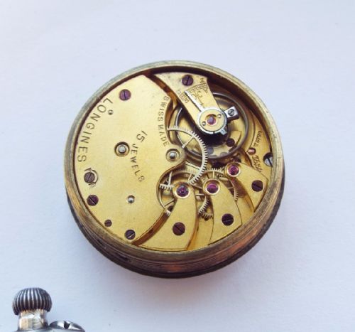 fig 2. A gents silver Longines wrist watch, 1928
