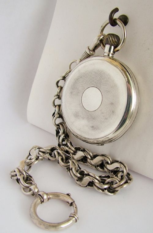 fig 1. 1920s silver pocket watch and chain.