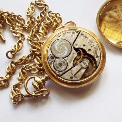 fig 1. 1922 gold plated Elgin pocket watch with chain