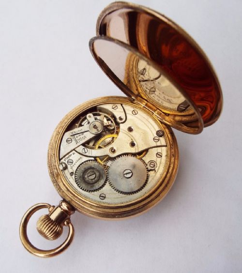 fig 1. A 1920s Swiss open faced pocket watch