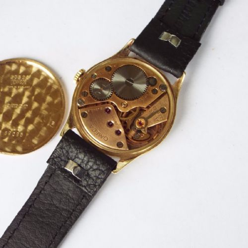 fig 2. A gents 1940s 9ct gold Omega wrist watch
