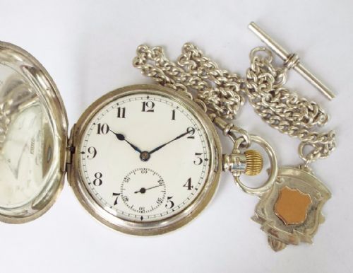 fig 1. 1920s silver hunter pocket watch, Urania Watch Co