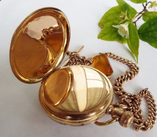 fig 2. 1940 Zenith open faced pocket watch with chain