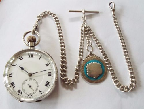 fig 1. Antique silver Globe pocket watch, chain and fob