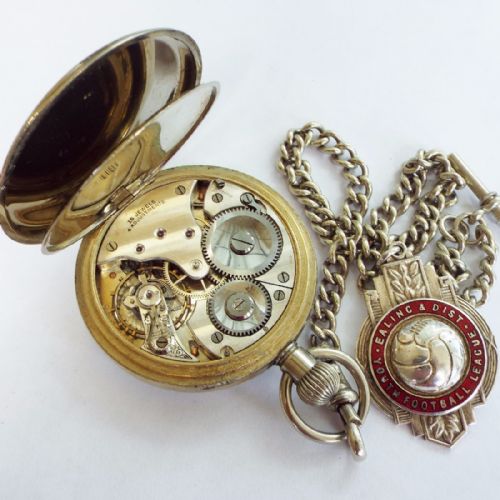 fig 2. A 1930s pocket watch, chain and football albert