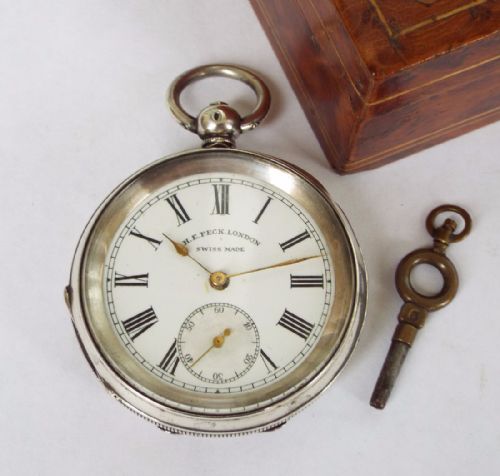 fig 1. Antique silver pocket watch, H E Peck, London