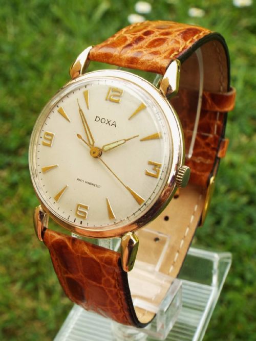 A Gents 1950s 14ct Rose Gold Doxa Wrist Watch