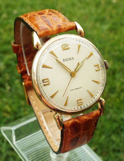 fig 1. A gents 1950s 14ct rose gold Doxa wrist watch