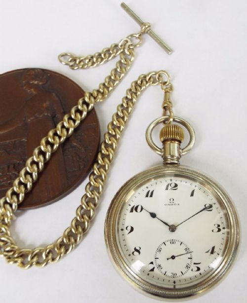 fig 1. Large antique Omega pocket watch with albert
