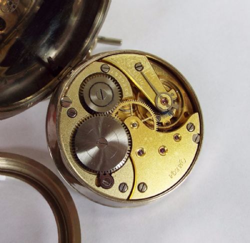 fig 2. Large antique Omega pocket watch with albert