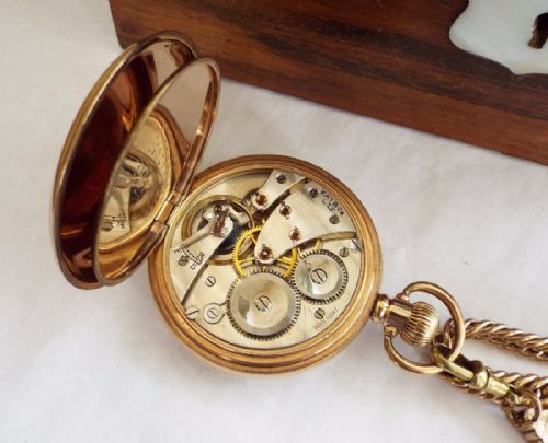 fig 2. An antique full hunter pocket watch from Kay & Co Ltd, with chain