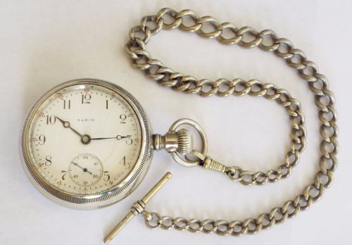 fig 1. An antique 1908 Elgin pocket watch and chain