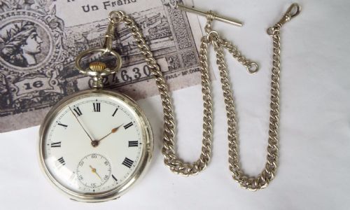 fig 1. Antique silver Omega pocket watch & double albert
