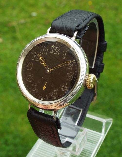 A Gents 1914 Silver Electa Trench Watch