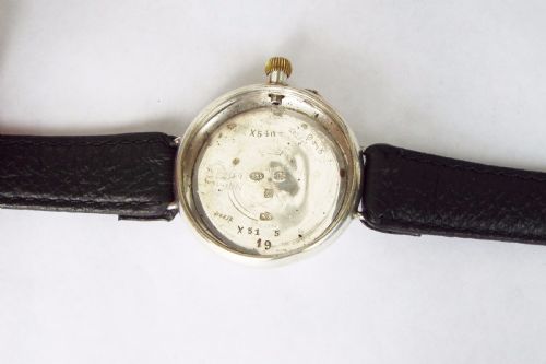 fig 3. Antique silver trench watch with Ormsby crest