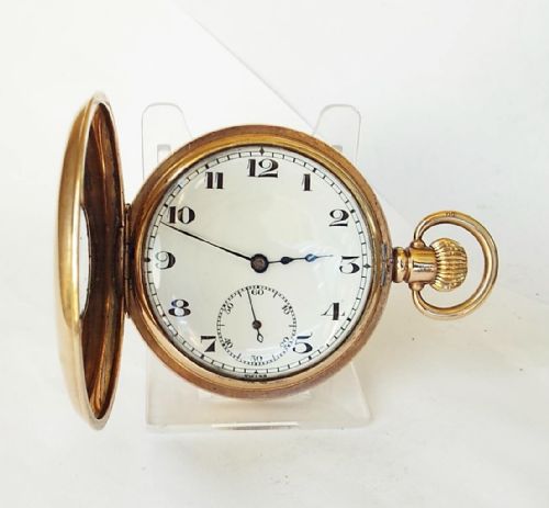 fig 1. A 1920s Swiss half hunter pocket watch.