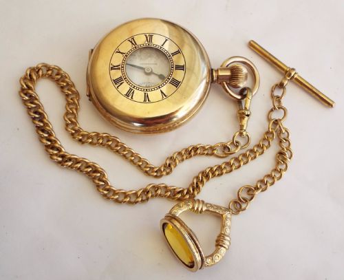 fig 1. Thomas Russell half hunter watch, chain and fob